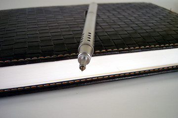 Image showing pen on notebook