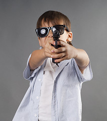 Image showing Boy with a weapon