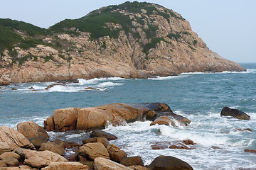 Image showing rocky sea coast and blurred water in shek o,hong kong 