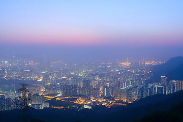 Image showing sunset city in mist