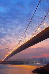 Image showing long bridge in sunset hour