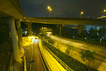 Image showing Modern Urban City with Freeway Traffic at Night