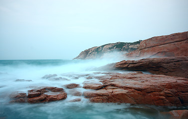 Image showing rocky sea coast and blurred water in shek o,hong kong 