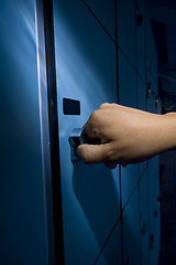 Image showing thief open locker