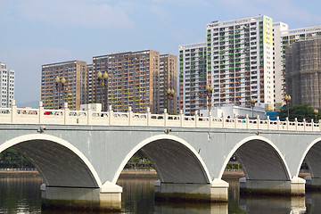 Image showing Arch bridge in asia downtown area, hong kong