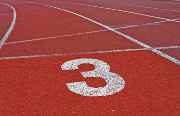 Image showing Running track numbers one two three in stadium 