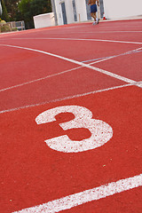 Image showing Running track numbers one two three in stadium 