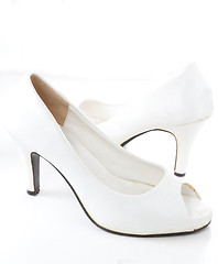 Image showing high heel women shoes on white background 