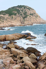 Image showing rocky sea coast and blurred water in shek o,hong kong 