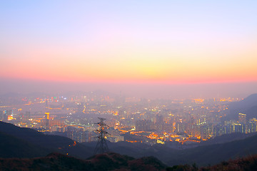 Image showing sunset city in mist