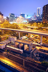 Image showing City and train rail, sunset moment