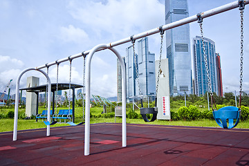 Image showing swing in city at day