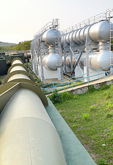 Image showing oil tanks and pipes outdoor at day 