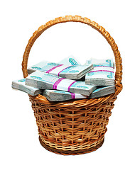 Image showing overflowing basket with money