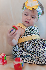 Image showing Little girl with matrioshka in her hand