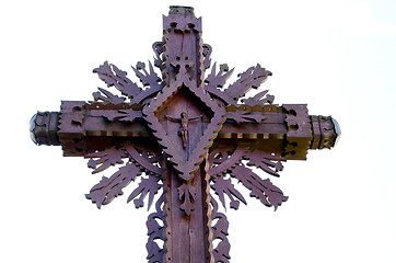Image showing Carved wooden cross with crucified Jesus isolated 