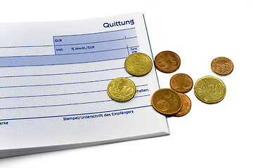 Image showing receipt with euro coins and ball-pen