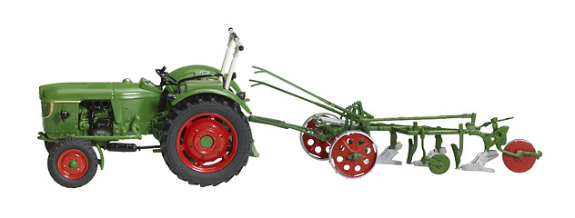 Image showing nostalgic toy tractor with plowshare