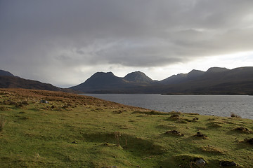 Image showing Loch Bad a Gail with dramatic sky