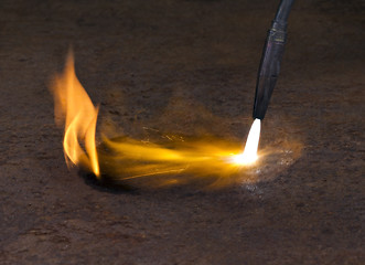 Image showing welding torch and flame
