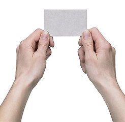 Image showing hands holding a business card