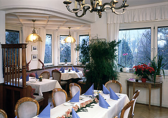 Image showing interieur with feastful dinner tables