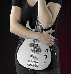 Image showing woman with bass guitar