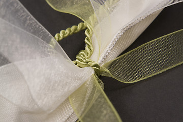 Image showing decorative white and green bow