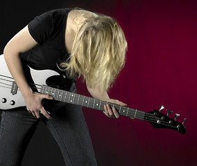 Image showing playing bass guitar