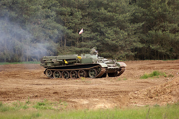 Image showing offroad scenery with driving tank