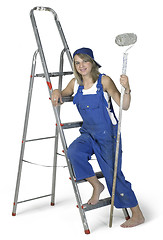 Image showing painting girl lean on a ladder