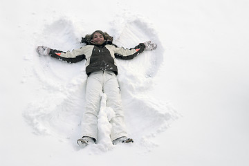 Image showing girl having fun in the snow