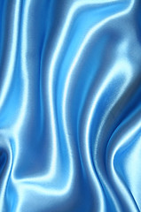 Image showing Smooth elegant blue silk as background 