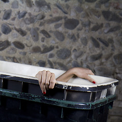 Image showing Woman inside of a garbage