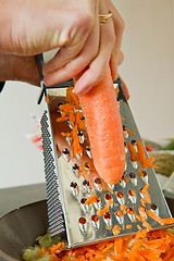 Image showing chef grating carrot