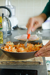 Image showing chef making salad