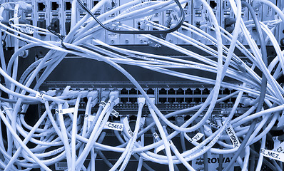 Image showing Fiber cables connected to servers 