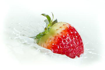 Image showing strawberry splashing into milk