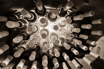 Image showing wine bottles stacked up