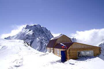 Image showing Wooden houses in high mountains. Ski resort 