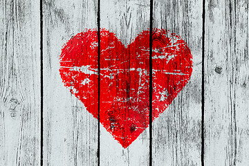 Image showing love symbol on old wooden wall