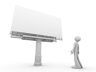 Image showing man stands near copyspaced bigboard looking at it