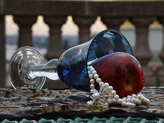 Image showing Blue Goblet with apple and pearls