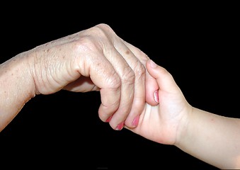 Image showing Grandmother holding grandson’s hand