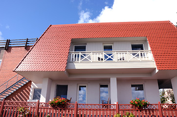 Image showing Private residential home balcony windows flowers 