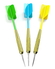 Image showing Three darts arrows, red, blue and yellow