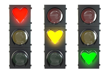 Image showing Set of traffic light with heart shaped red, yellow and green lam