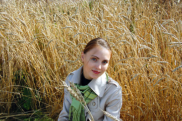 Image showing woman in the ears. autumn