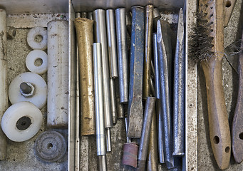 Image showing tools in drawer - chisel, punch, steel brush