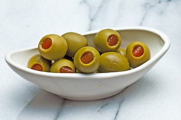 Image showing olives filled with red paste